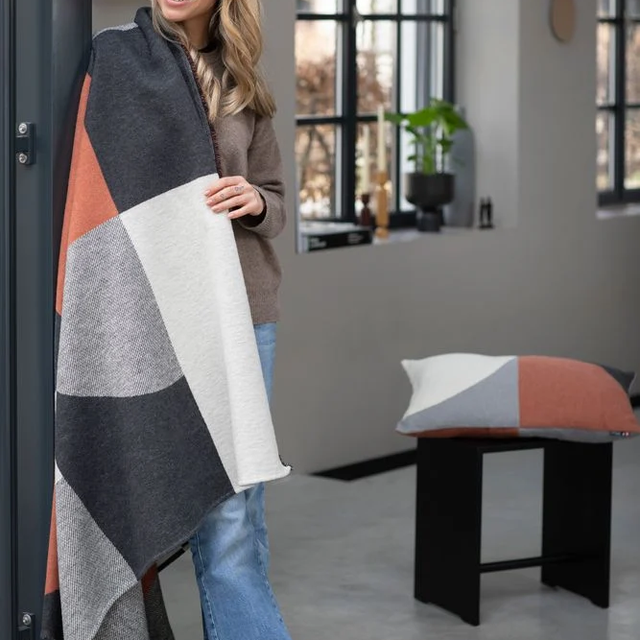 LUCA Throw "Modular Forms" copper/charcoal — shown for scale
