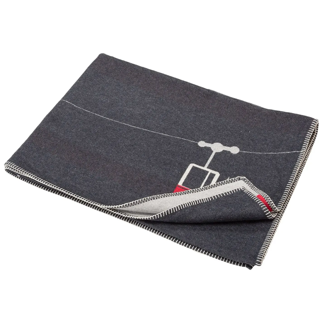 Sylt Throw "Ski Slopes and Gondolas" charcoal — folded, showing blanket-stitch edge