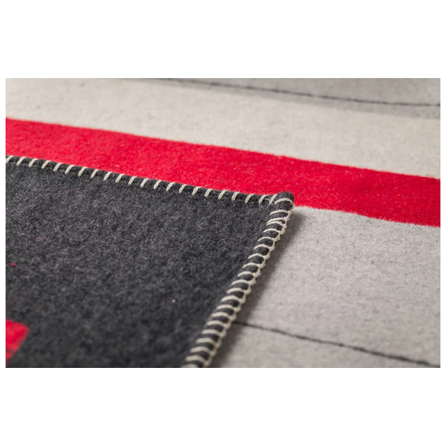 Sylt Throw "Ski Slopes and Gondolas" charcoal — edge and stitch detail