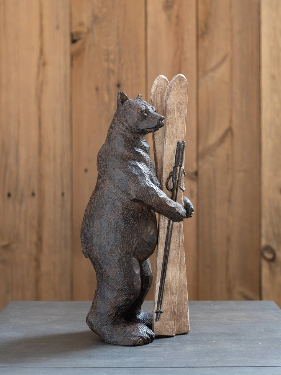 Bear Holding Skis